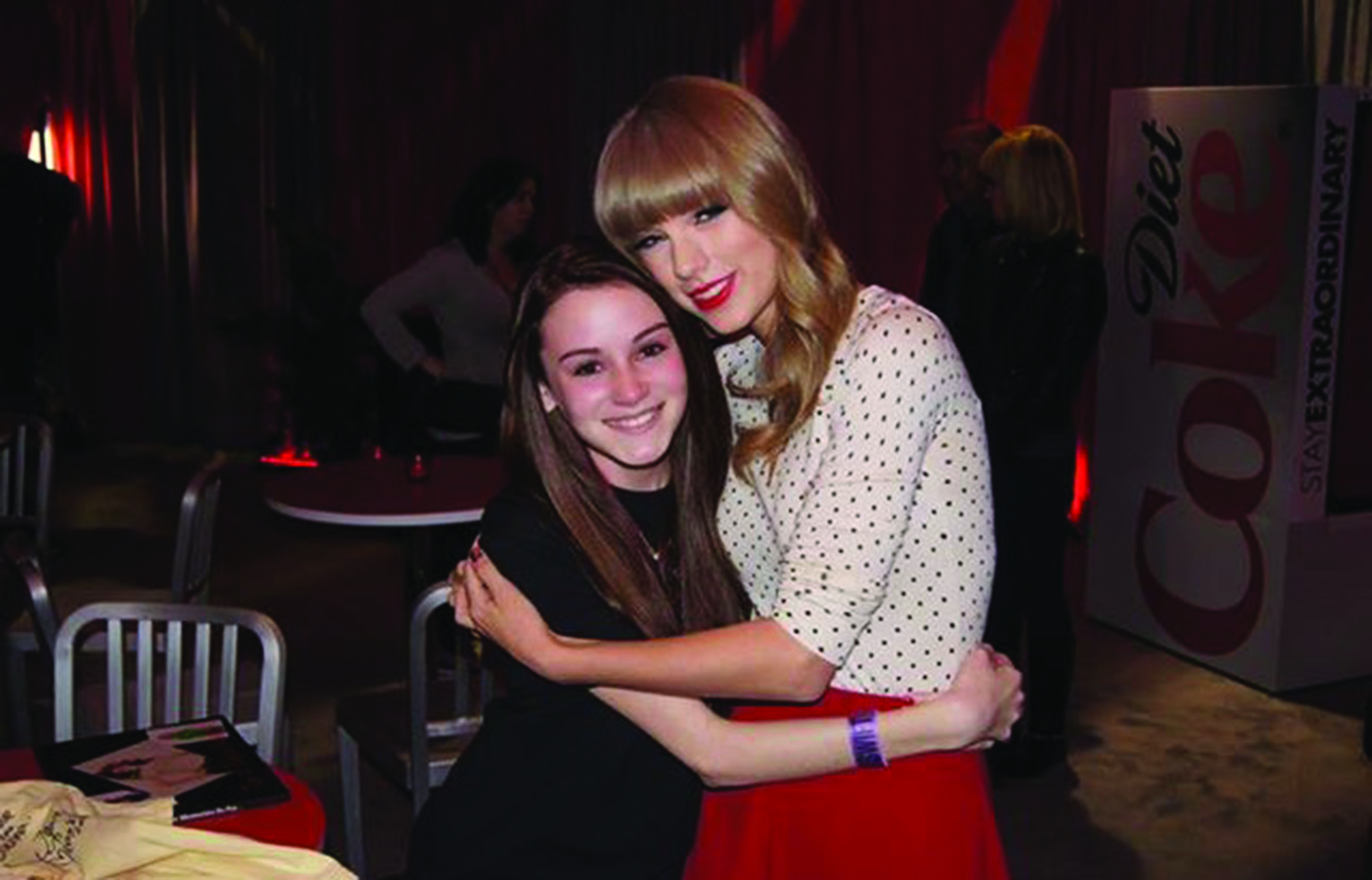 Junior Brenna Bode, left, and Taylor Swift pose for a photo before one of Swifts concerts. Bode has become friends with the pop star.
Courtesy Photo
