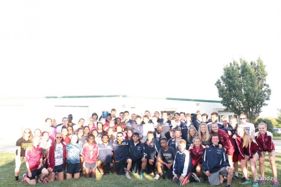LNS Cross Country team celebrates their victory of winning the combined girls and boys traveling trophy since 2006.