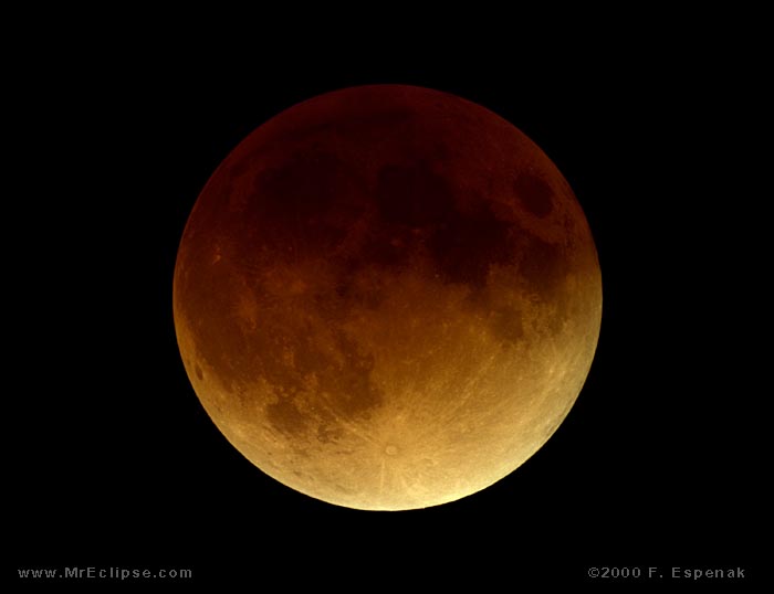 The moon glows a orange color during an early 2000s lunar eclipse. Photo Courtesy Of: NASA