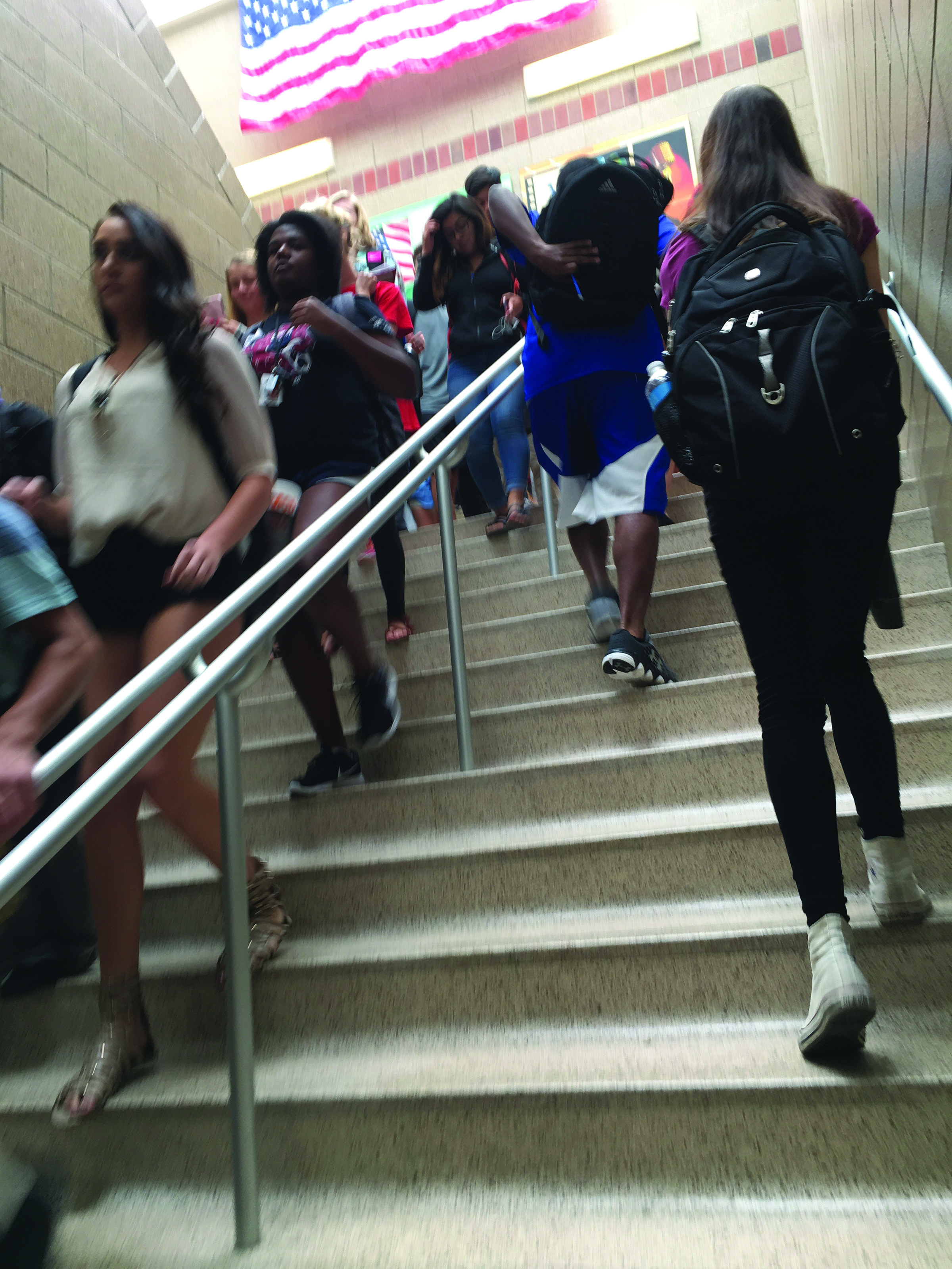 North Star students travel up and down the staircase on their way to class. With approximately 2,200 students enrolled this school year, hallways have become congested. Student Council is considering multiple measures to help keep traffic flowing.
Photo by Olyvia Hillman/GG Staff