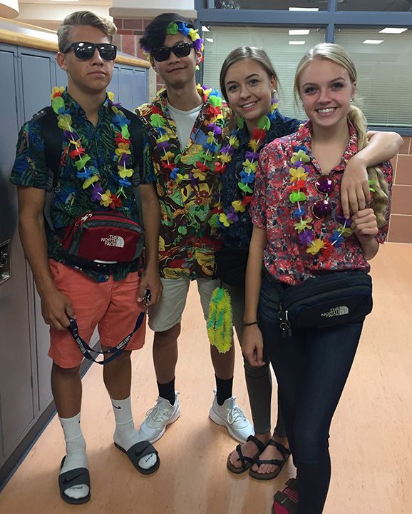 Ethan Wobken (11),  Johnny Nguyen (11), Jordyn Becwar (10), and Paige Svehla (10) dress for vacation on Tacky Tourist Tuesday. Photo by Olivia Kriz/GG Staff