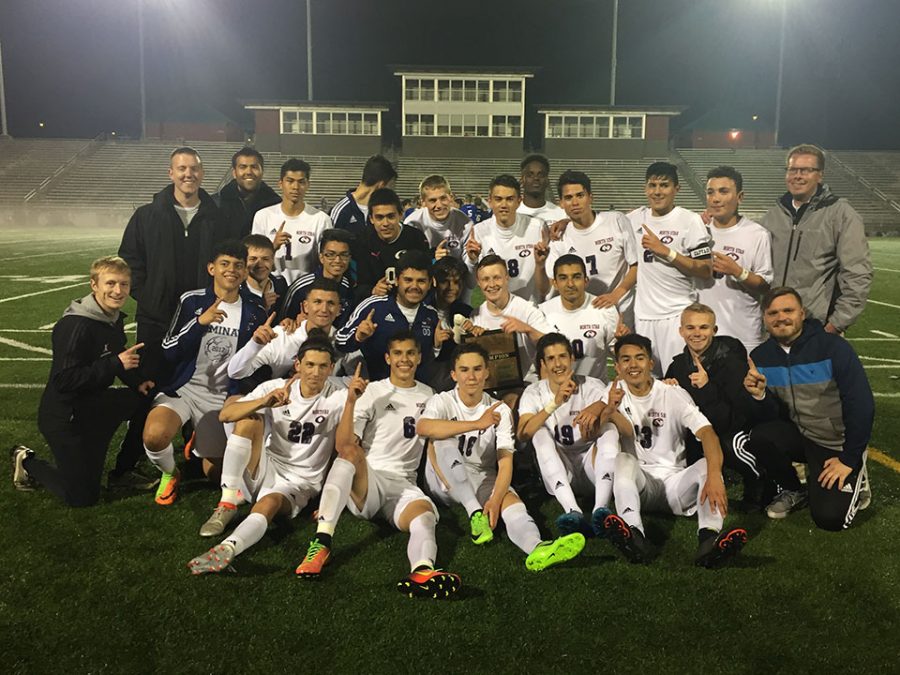 The North Star boys varsity soccer team celebrates with a photo after winning the district A-3 championship game on May 3.
Photo by Christina Nevitt/GG Advisor