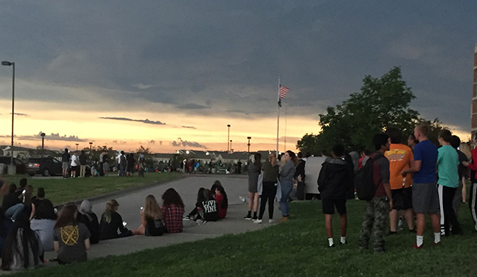 Sun creeps back to the horizon after the solar eclipse on Aug. 24. Cloud cover in north Lincoln made it difficult to see totality.
Photo by Christina Nevitt / GG Advisor