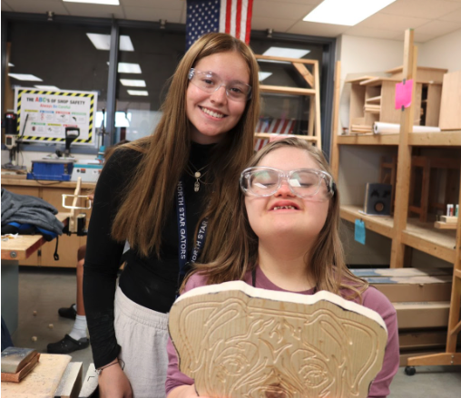 Paige Steiner and Marley Athens work together on a project. 