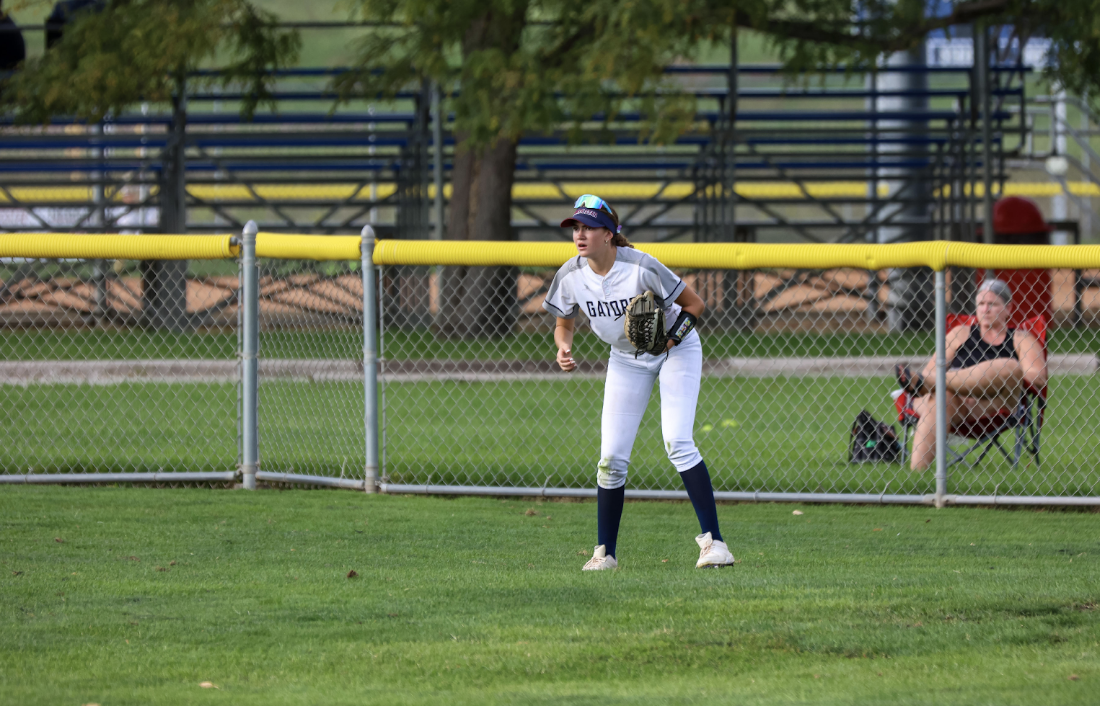 Prepping for the pitch to happen against cross town rival Lincoln Southwest, Olivia Knox proves to be a star player for the LNS Gator Softball team. 